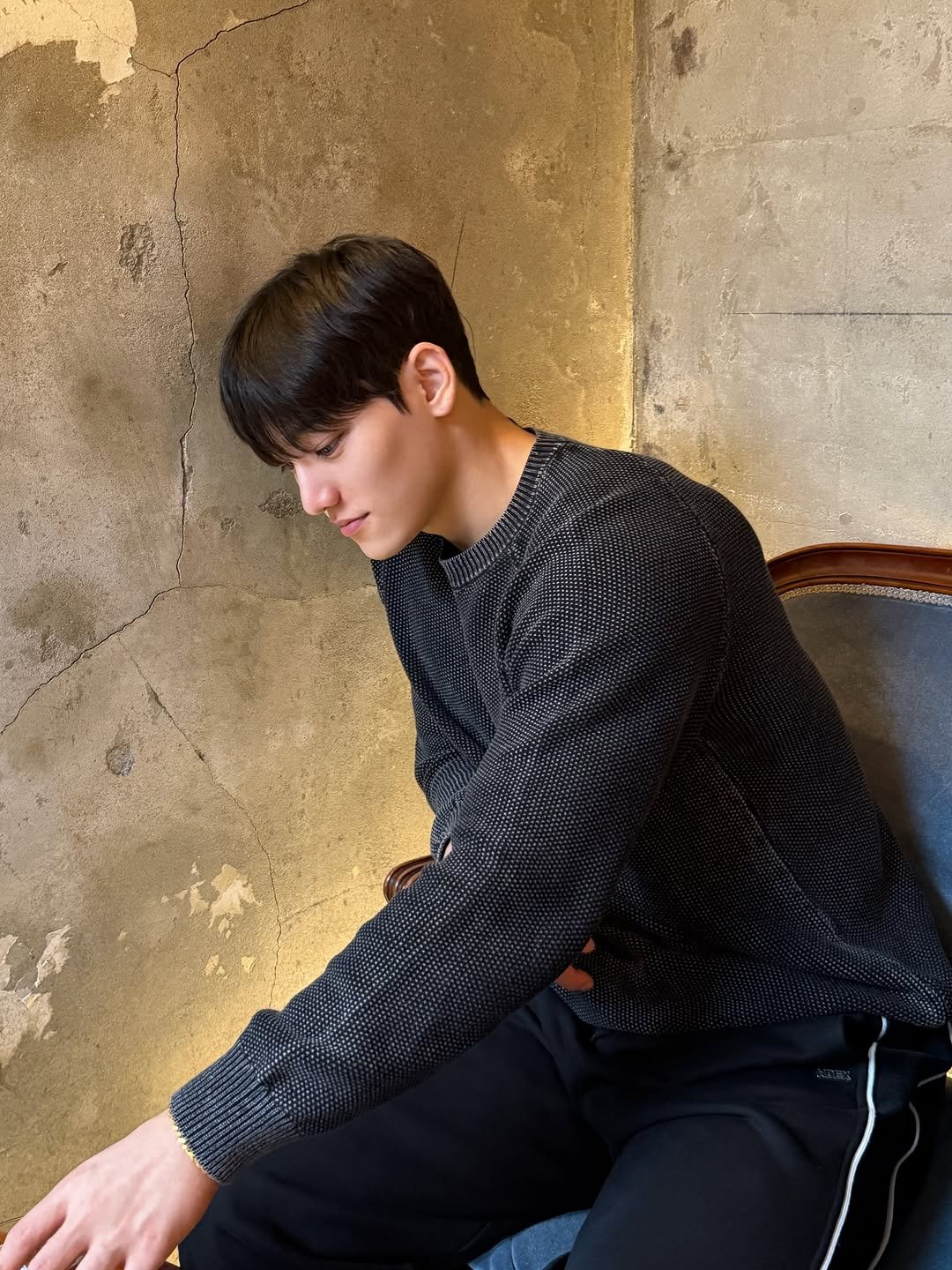 Photo by 임득균 on February 24, 2026. May be an image of top, turtleneck, sweatpants, sportswear and text.
