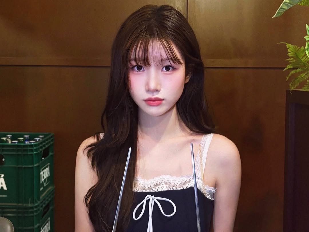 Photo by 이로아 on August 18, 2025. May be an image of 1 person, hair, top, bra and text.