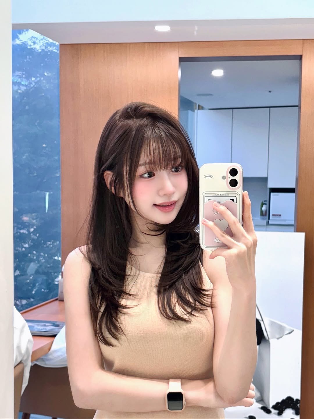 Photo by 이로아 on August 25, 2025. May be a selfie of 1 person, hair, phone, top, mirror and text.