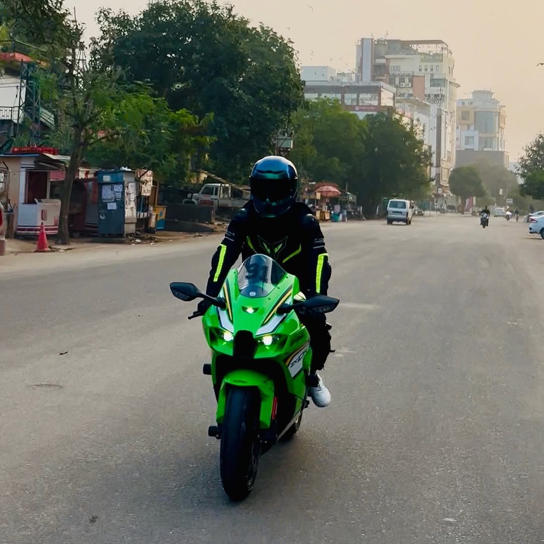 Photo by KANHAIYA SHARMA on December 01, 2025. May be an image of racing vehicles, motorcycle, helmet, scooter, road and text.