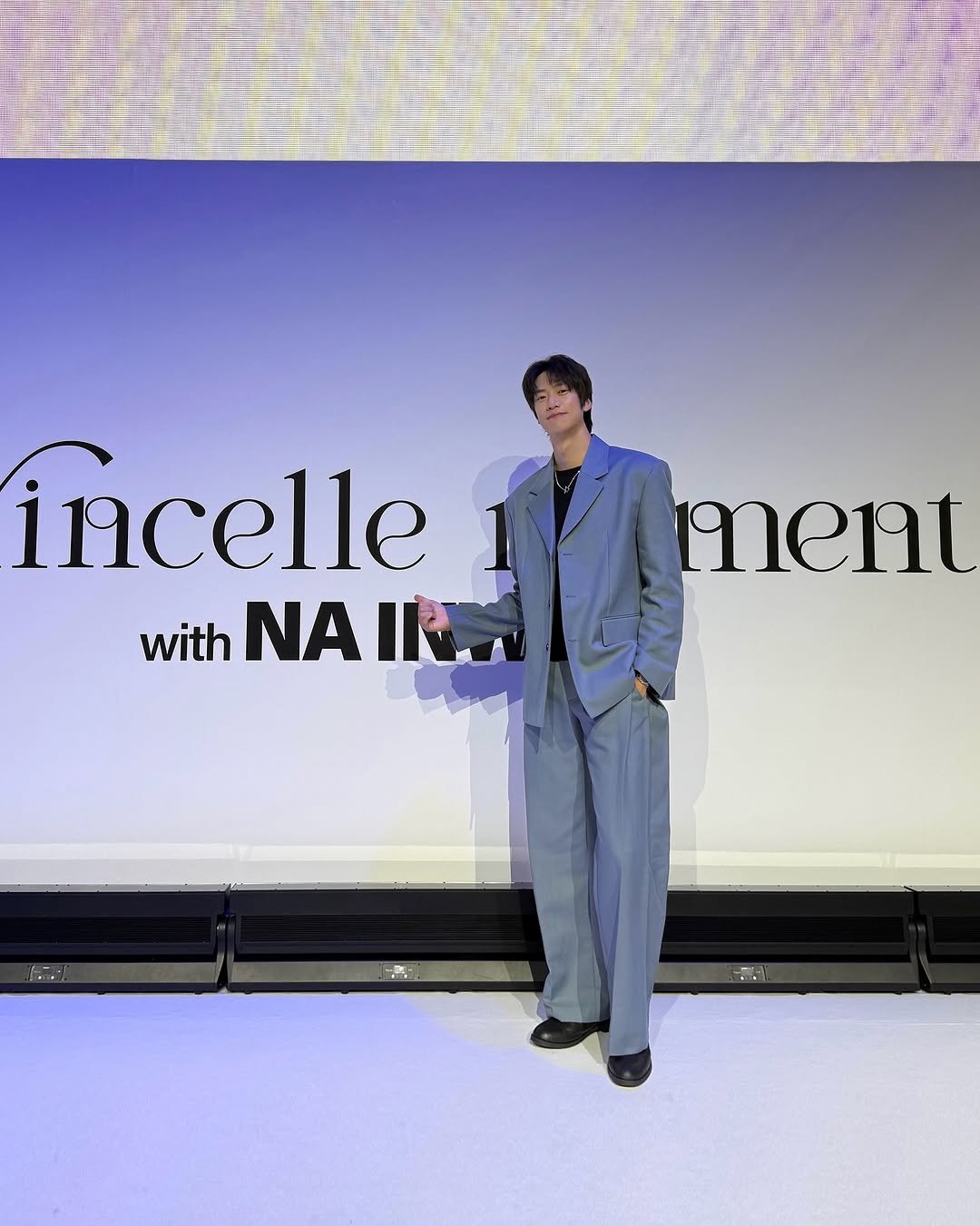 Photo by 나인우 NA INWOO on November 10, 2025. May be an image of one or more people, makeup, suit, magazine and text that says 'incelle with ΝΑ IN iment'.