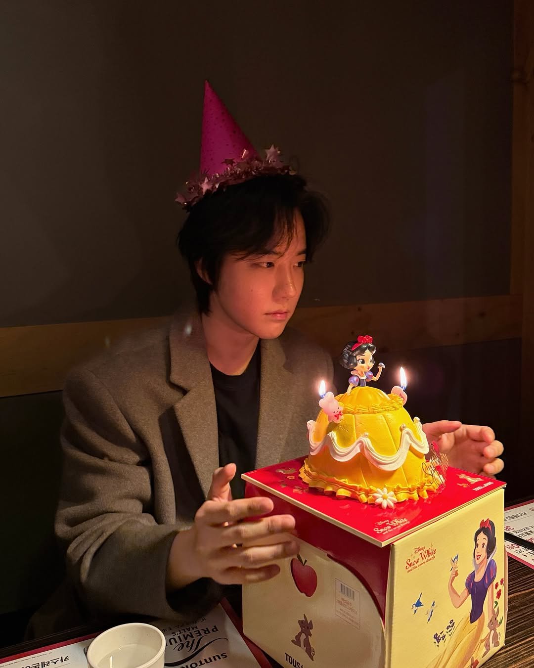 Photo by 유도열 on February 21, 2026. May be an image of candle, cake and text.