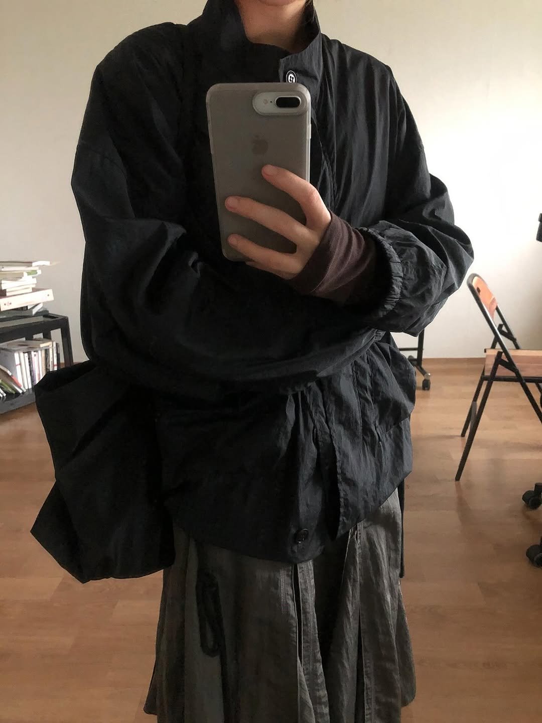 Photo shared by kimyoung on October 13, 2025 tagging @_aftermonday, @monochrome.kr, and @colocynth.official. May be an image of cloak, costume, robe, bath robe and text.