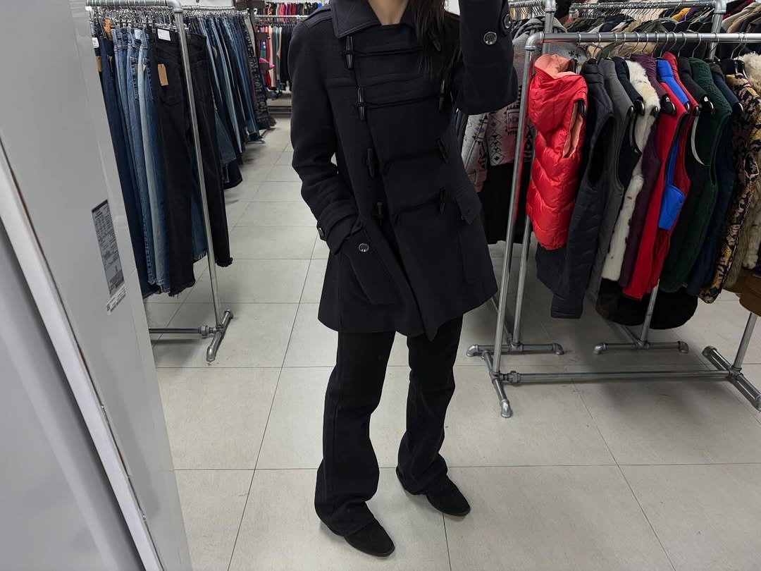 Photo shared by kimyoung on February 12, 2026 tagging @dokback.kr. May be an image of duffle coat, goosedown coat, overcoat, jacket, fleece, raincoat, parka and text.