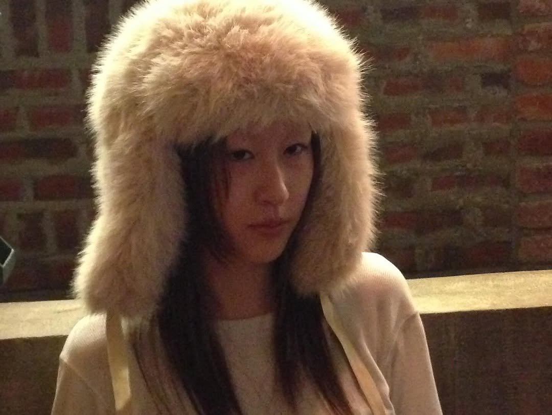 Photo by kimyoung on December 10, 2025. May be an image of one or more people, bangs, duffle coat, goosedown coat, fur coat and hat.