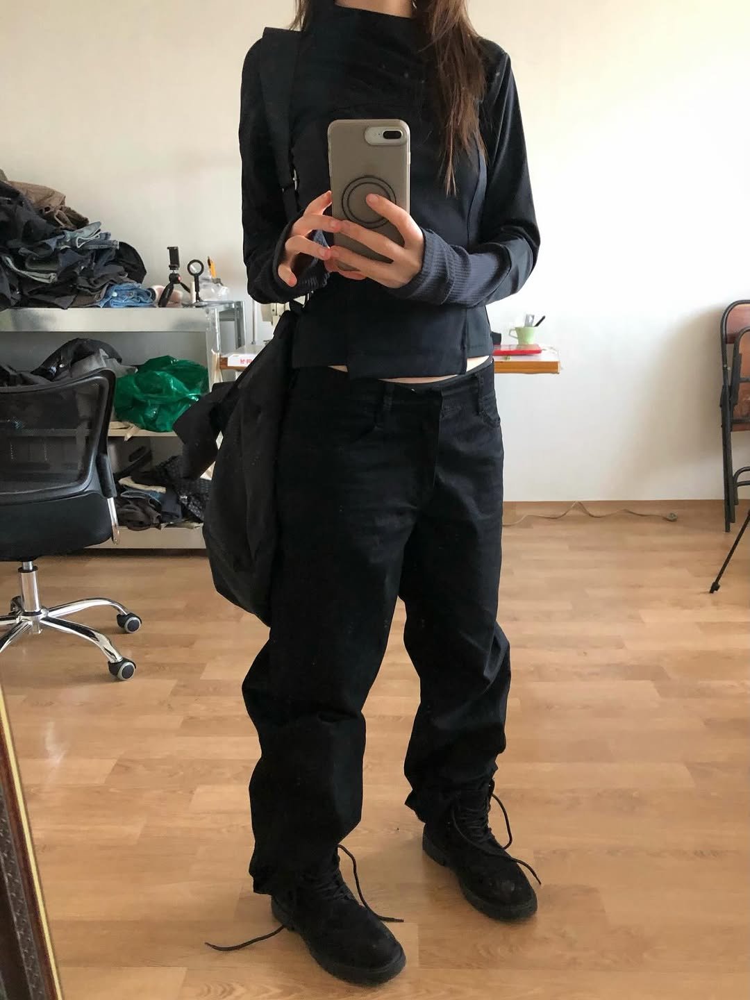 Photo shared by kimyoung on March 31, 2026 tagging @wet2ag. May be an image of pants, parka, turtleneck, boots, face mask, sweatpants and text.