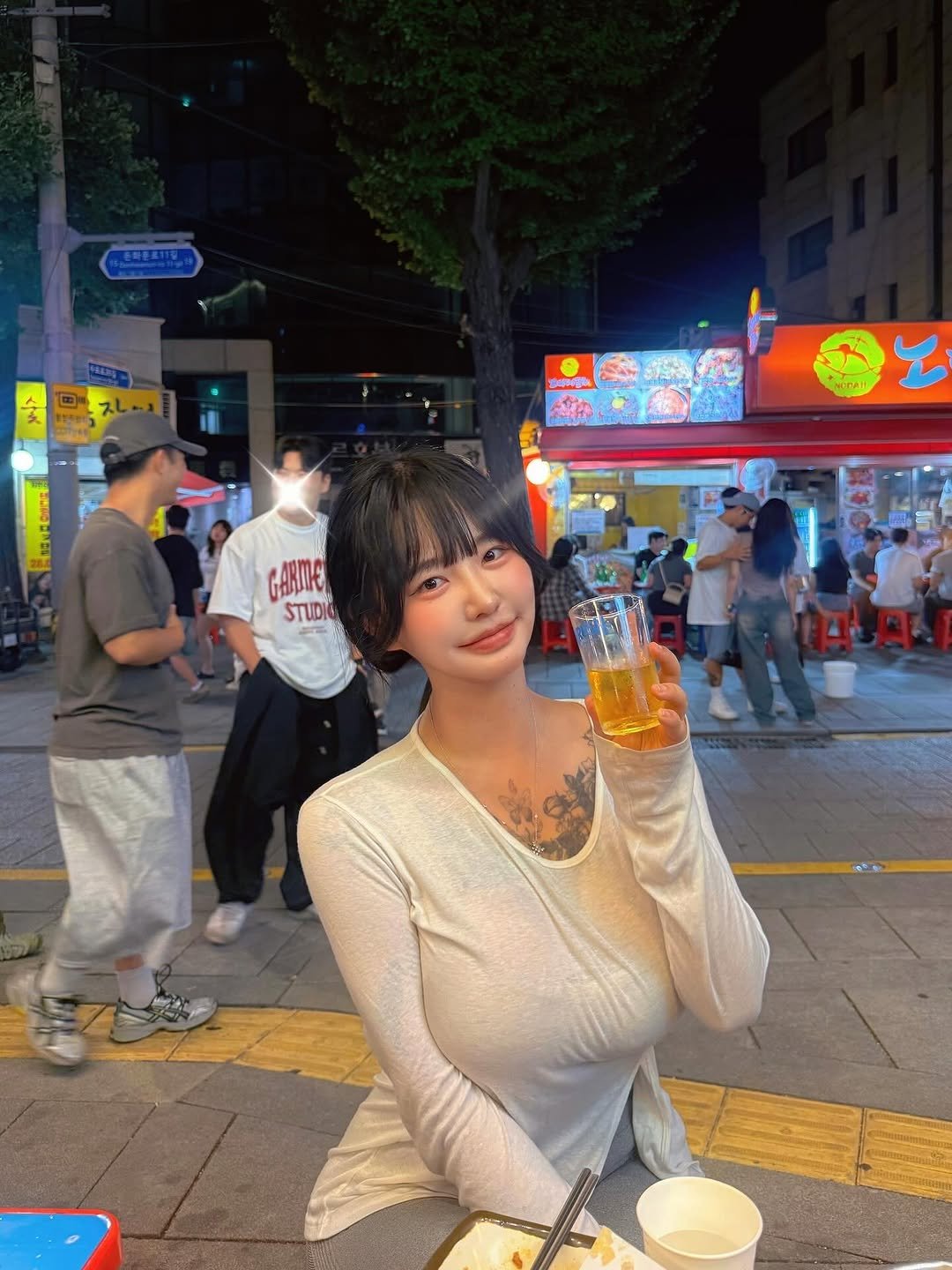Photo by 전보연 on August 16, 2025. May be an image of 8 people, hair, beer, night and text.