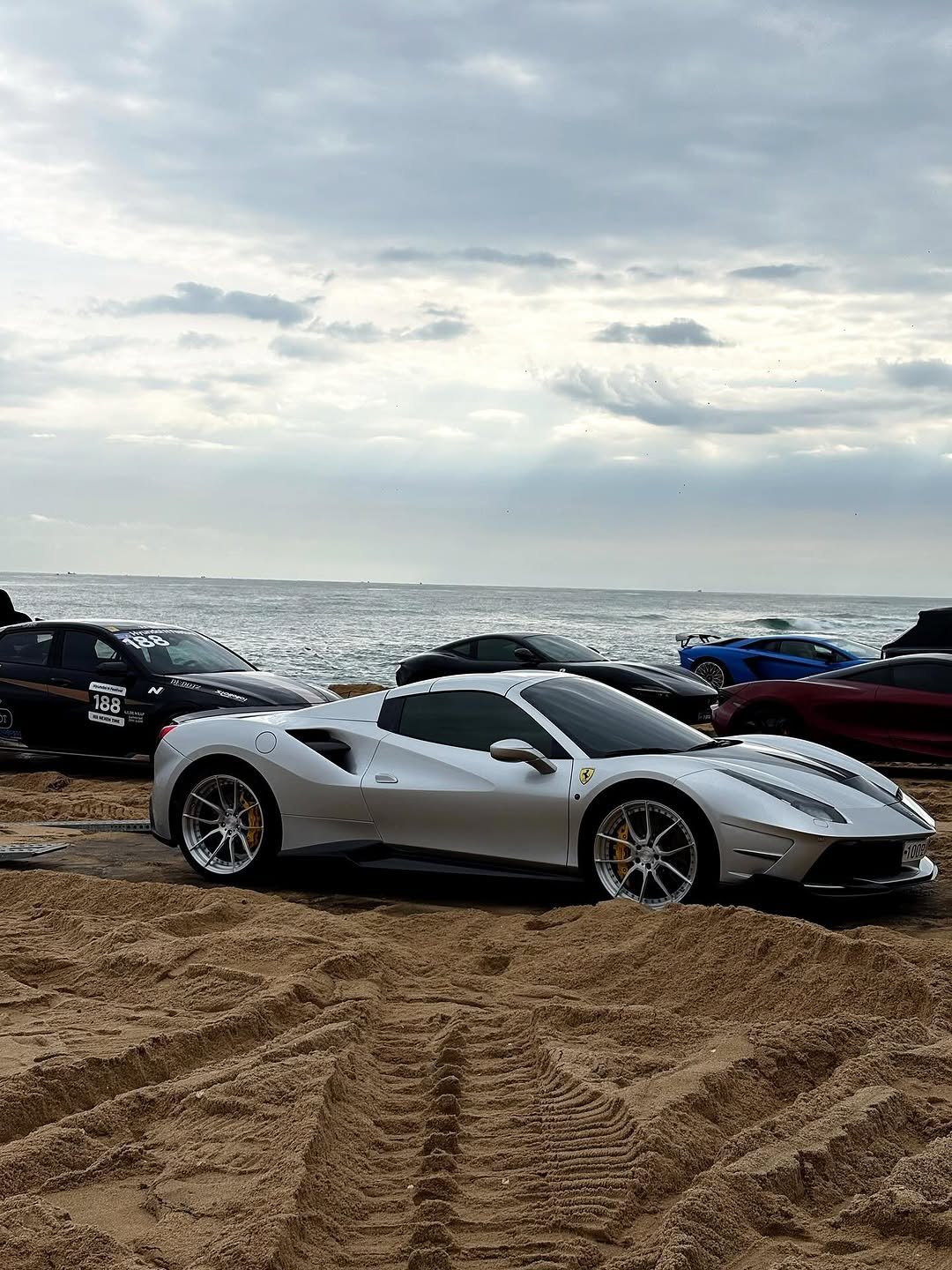 Photo by 은혜 on October 26, 2025. May be an image of car, roadster, convertible, wheel and text.