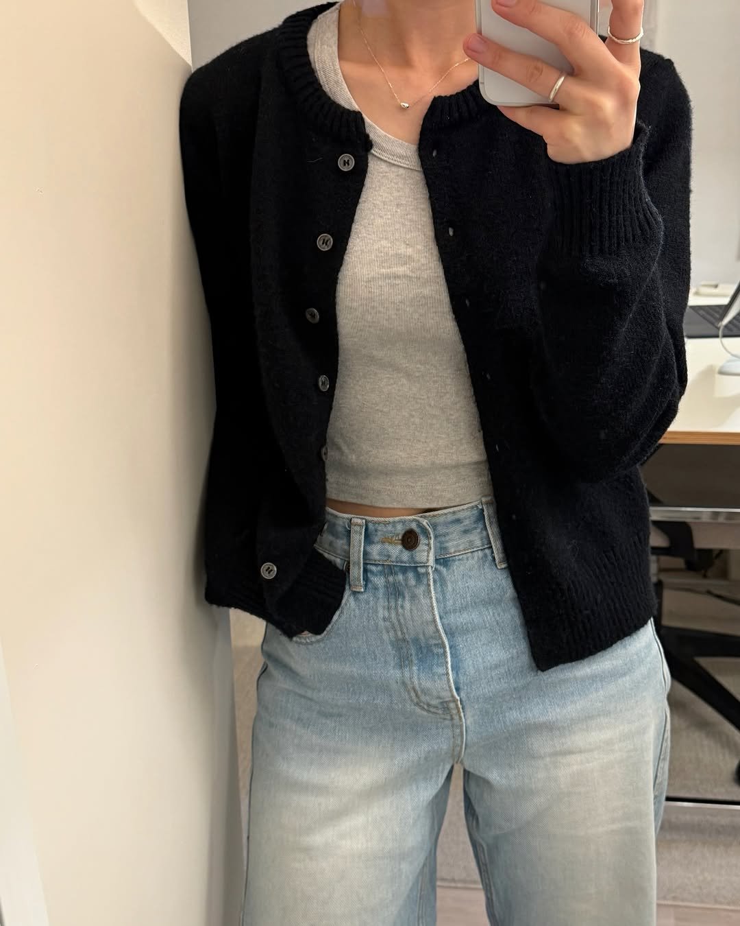 Photo by 은혜 on January 27, 2026. May be an image of cardigan, top and text.