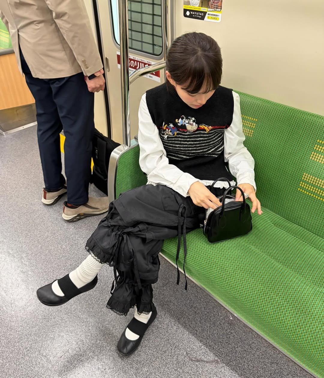 Photo by 지연 on November 22, 2025. May be an image of train, sling, portable cassette player and text.