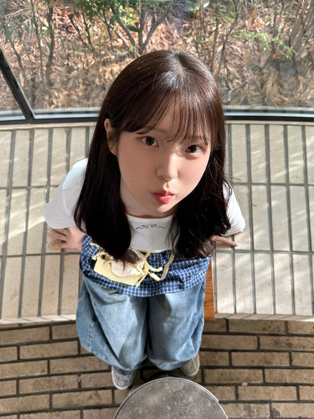 Photo by 유수현 on August 08, 2025. May be an image of 1 person, doll and text.