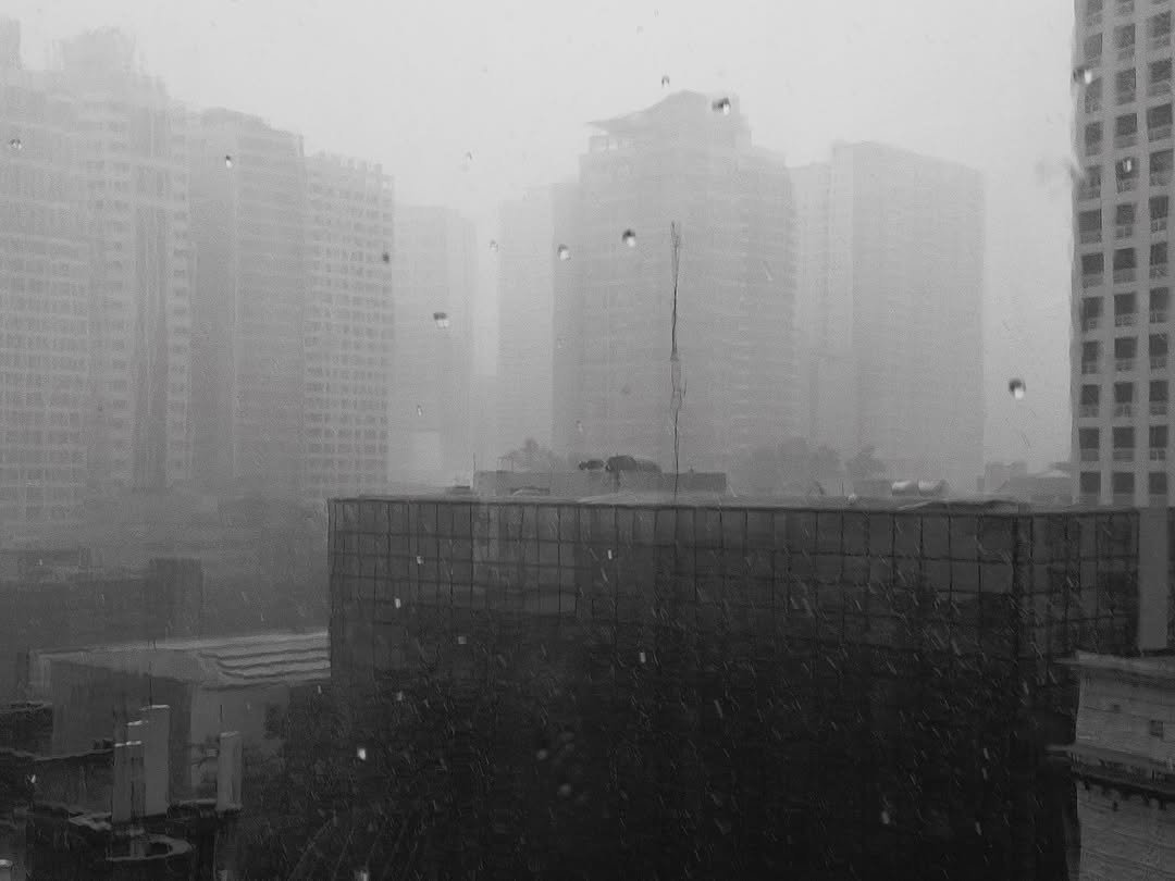 A shot of the rain from inside an office building in Makati