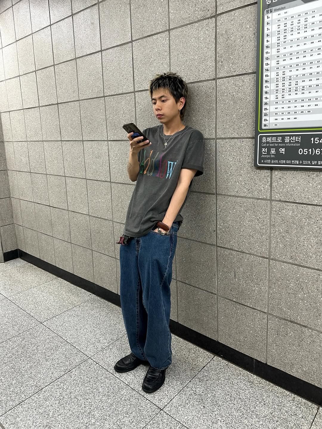 Photo shared by 피로 on June 28, 2025 tagging @addslow.official. May be an image of 1 person, standing, phone, portable cassette player and text.