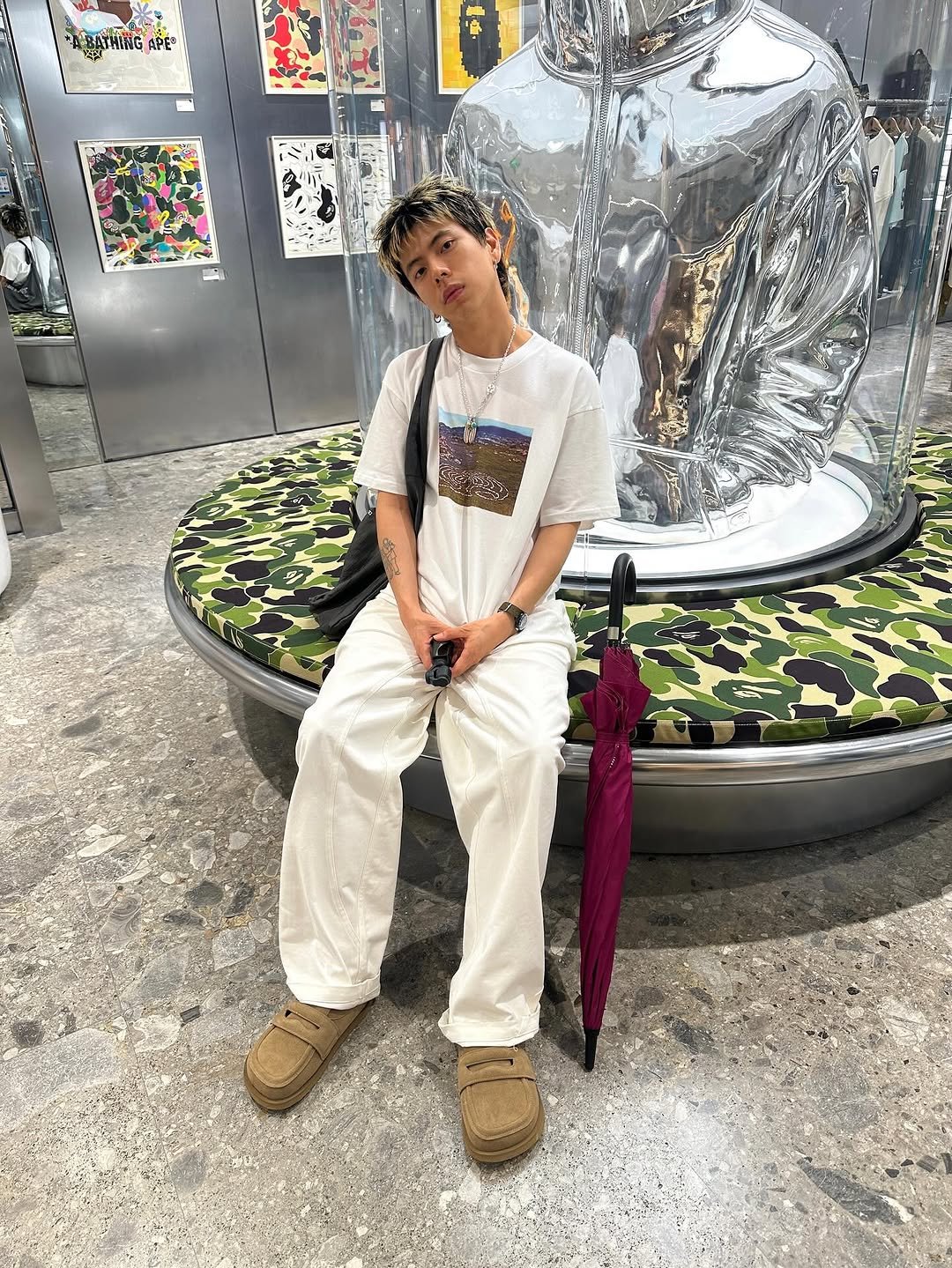 Photo shared by 피로 on July 15, 2025 tagging @carharttwip_kr, and @kinchi_official. May be an image of 1 person, sweatpants and text.
