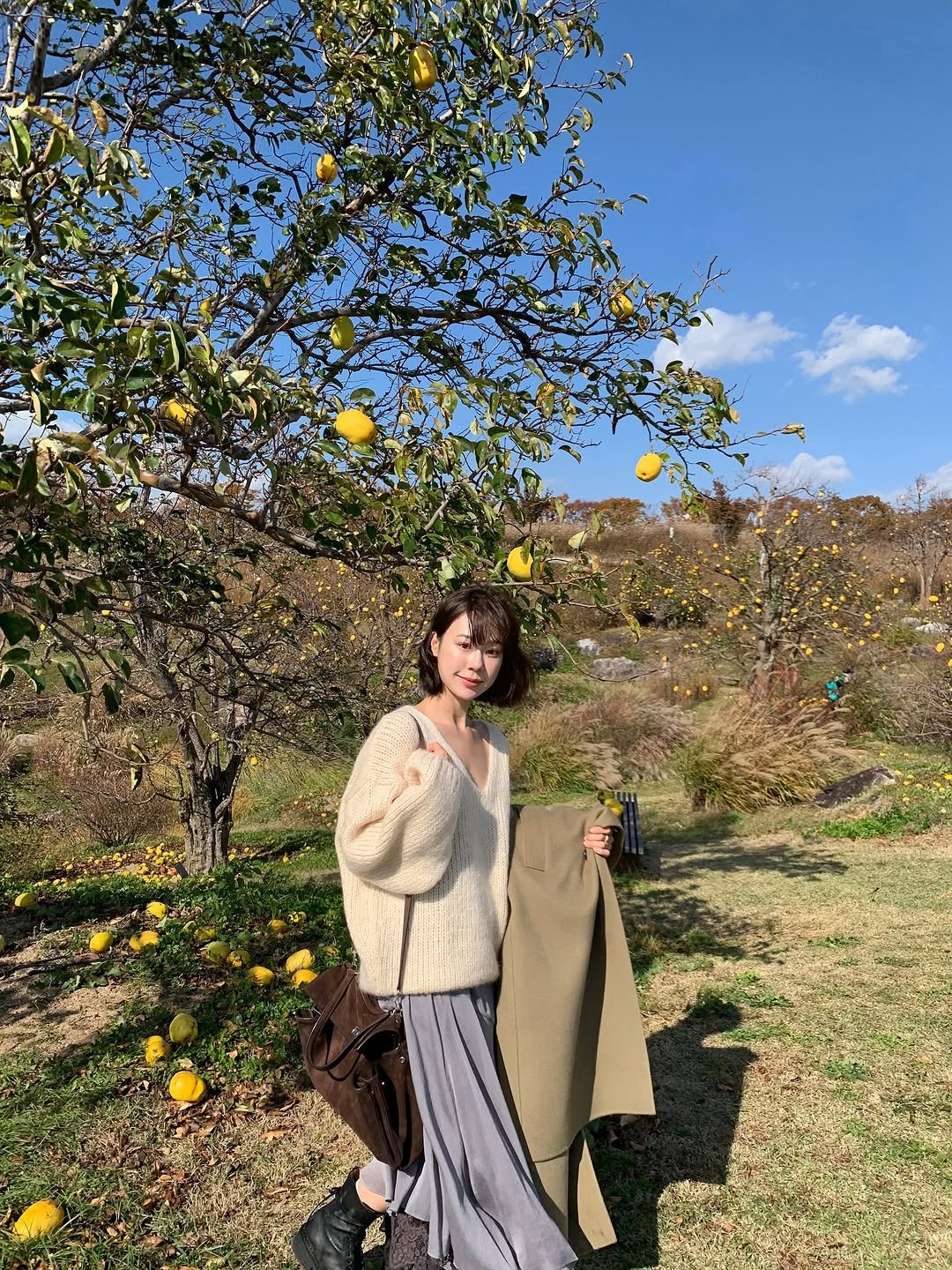 Photo by 주미 on November 08, 2025. May be an image of overcoat, cloak, outdoors and text.