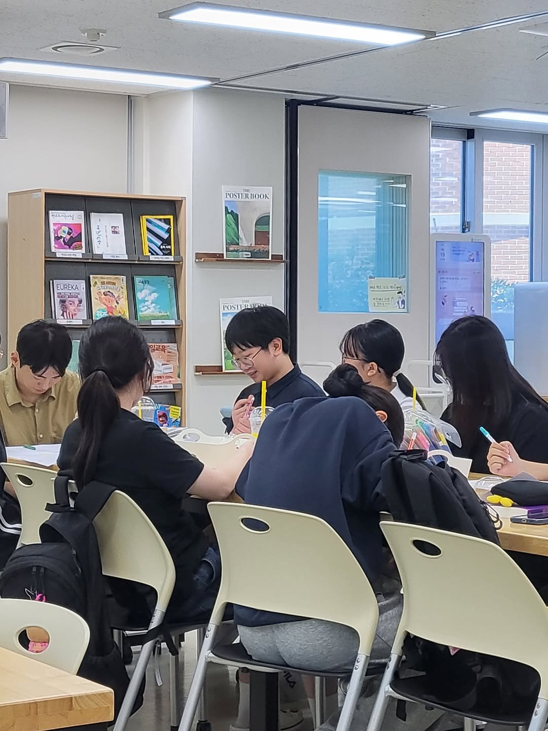 Photo by 인공위성 on September 15, 2025. May be an image of 6 people, people studying, table, lego and text.