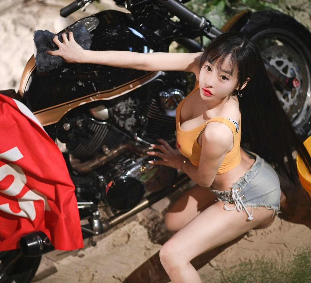 Photo shared by 이신비 정하얀 on November 16, 2025 tagging @sinbi_way. May be an image of motorcycle, scooter, bra, outdoors and text.