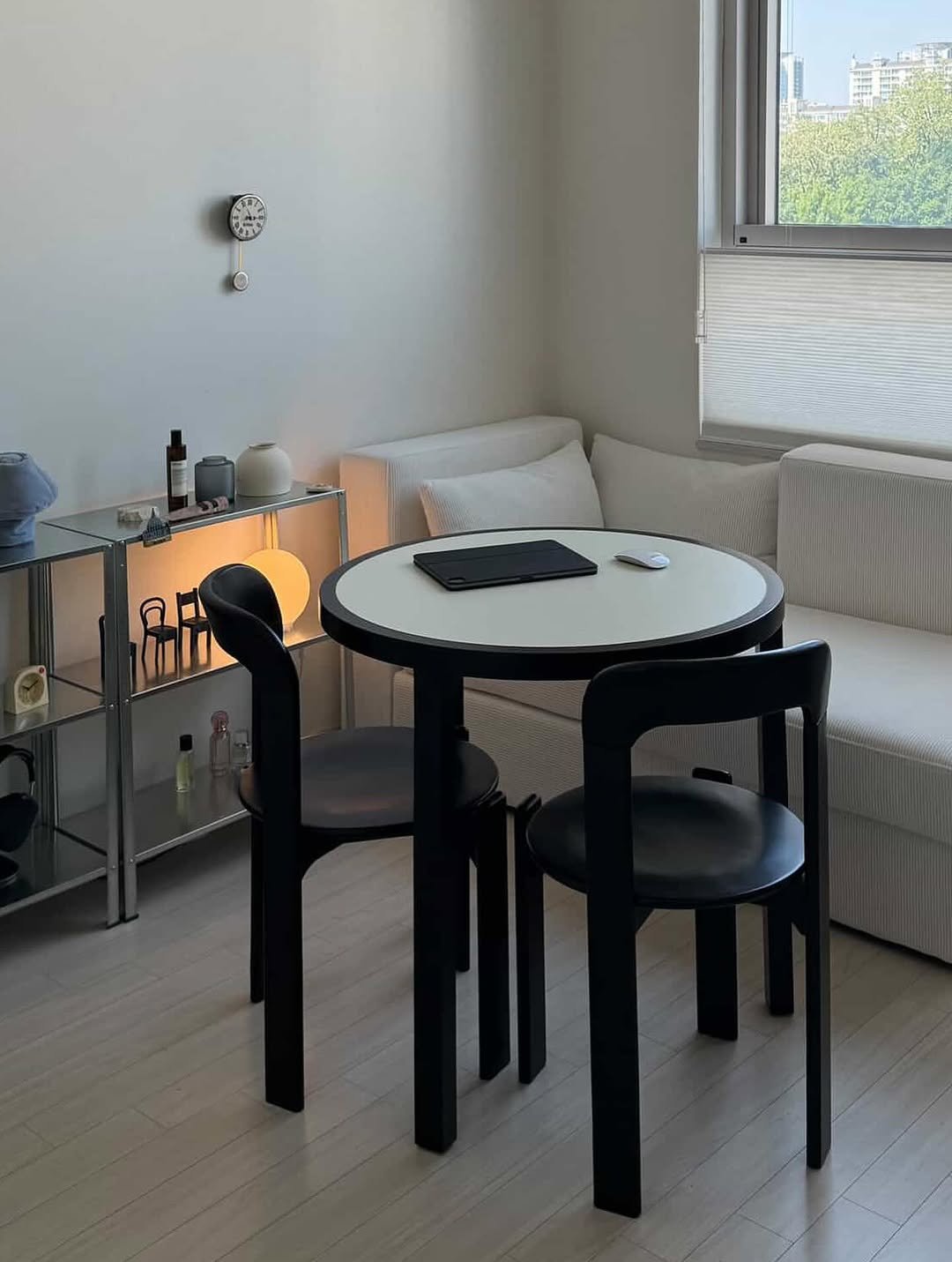 Photo by 2UC inc. on August 06, 2025. May be an image of table, armchair, dining table, indoors and text.