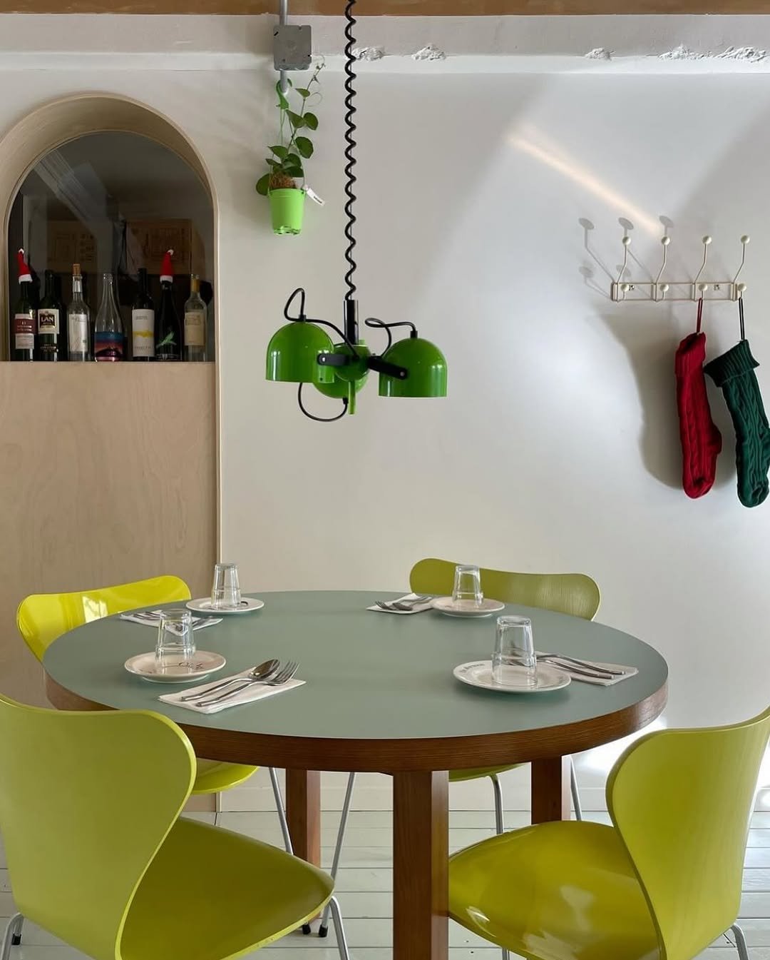 Photo by 2UC inc. on July 30, 2025. May be an image of table, lighting, chandelier, rack, dining table, indoors and text.