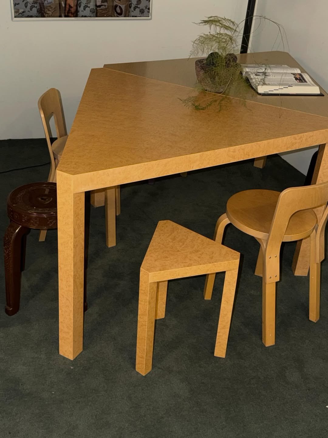 Photo by 2UC inc. on April 13, 2026. May be an image of table, dining table, armchair, desk, indoors and text.