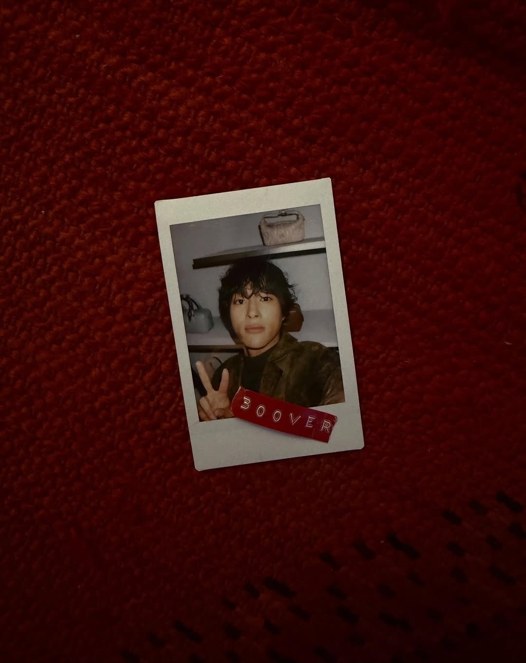 Photo shared by 홍태준 TaeJun on November 12, 2025 tagging @miumiu. May be an image of polaroid and text.