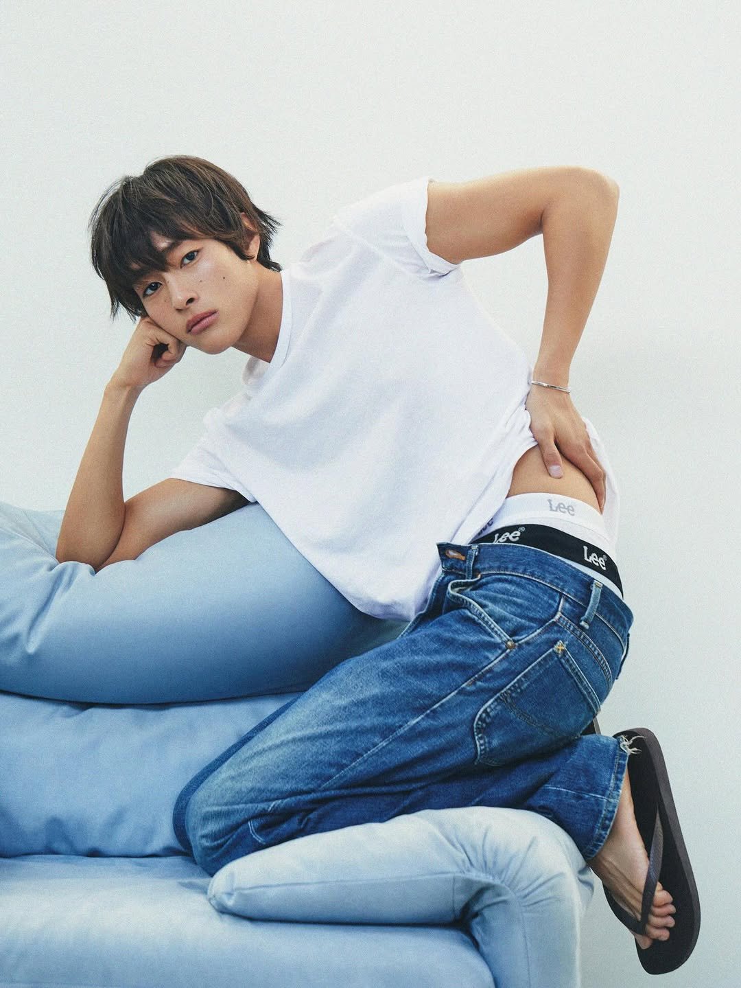 Photo shared by 홍태준 TaeJun on February 20, 2026 tagging @leebodywearkr. May be an image of one or more people, bangs, top and text.