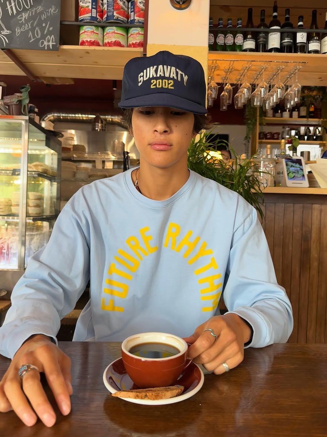 Photo by 홍태준 TaeJun on September 14, 2025. May be an image of coffee cup, hat, cappuccino, cup, cornflower and text.