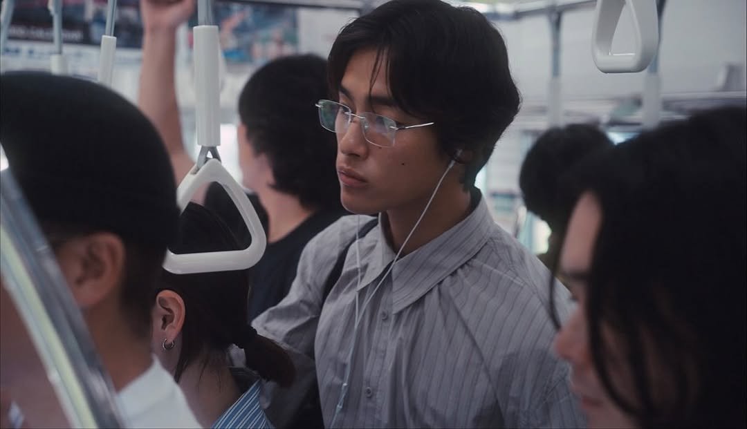 Photo shared by 홍태준 TaeJun on October 30, 2025 tagging @amomento.co, and @amomento_tokyo. May be an image of one or more people, bus, terminal and text.