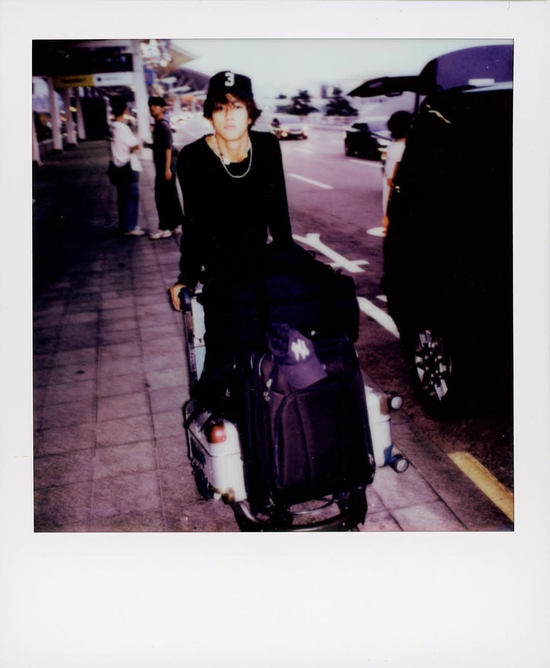 Photo shared by 홍태준 TaeJun on October 18, 2025 tagging @zyobb, and @leejyhoo. May be an image of polaroid, suitcase, luggage and text.