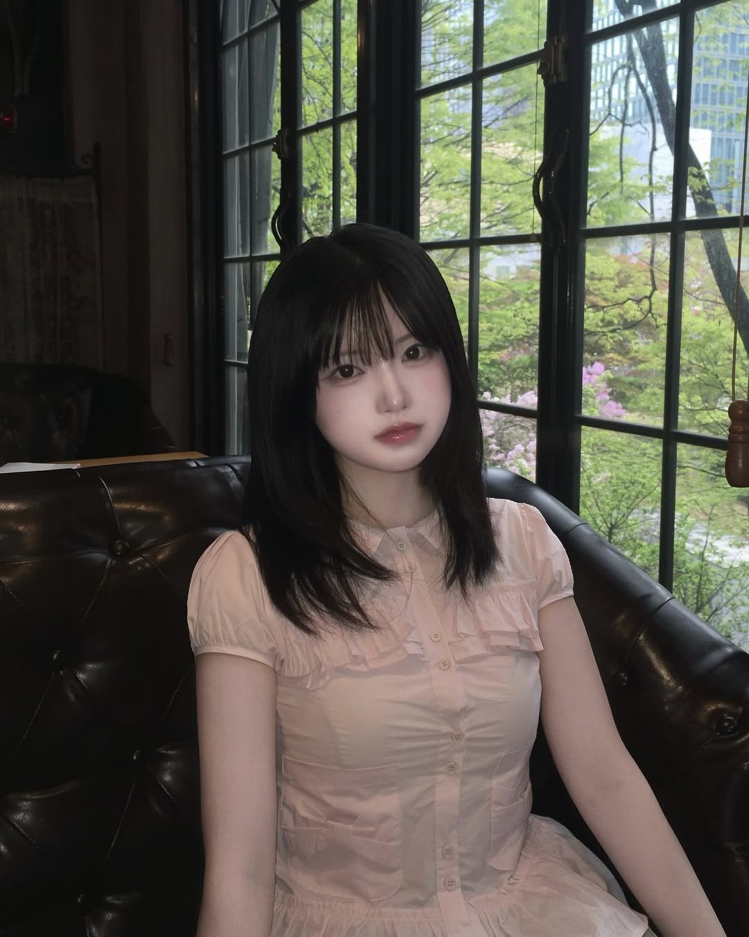 Photo shared by 강비 on April 12, 2026 tagging @illigo.kr, and @illigo.world. May be an image of one or more people, hair, dress and text.