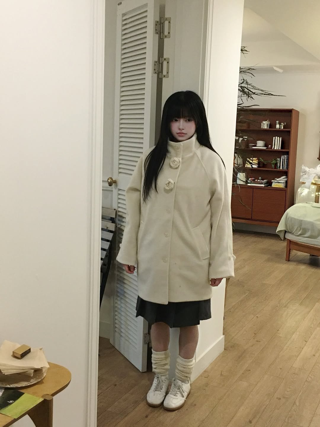 Photo by 강비 on December 15, 2025. May be an image of duffle coat, overcoat, parka and text.