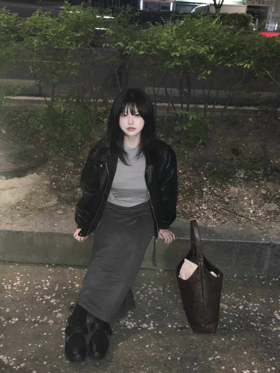 Photo shared by 강비 on April 08, 2026 tagging @flareup_official. May be an image of duffle coat, parka and text.