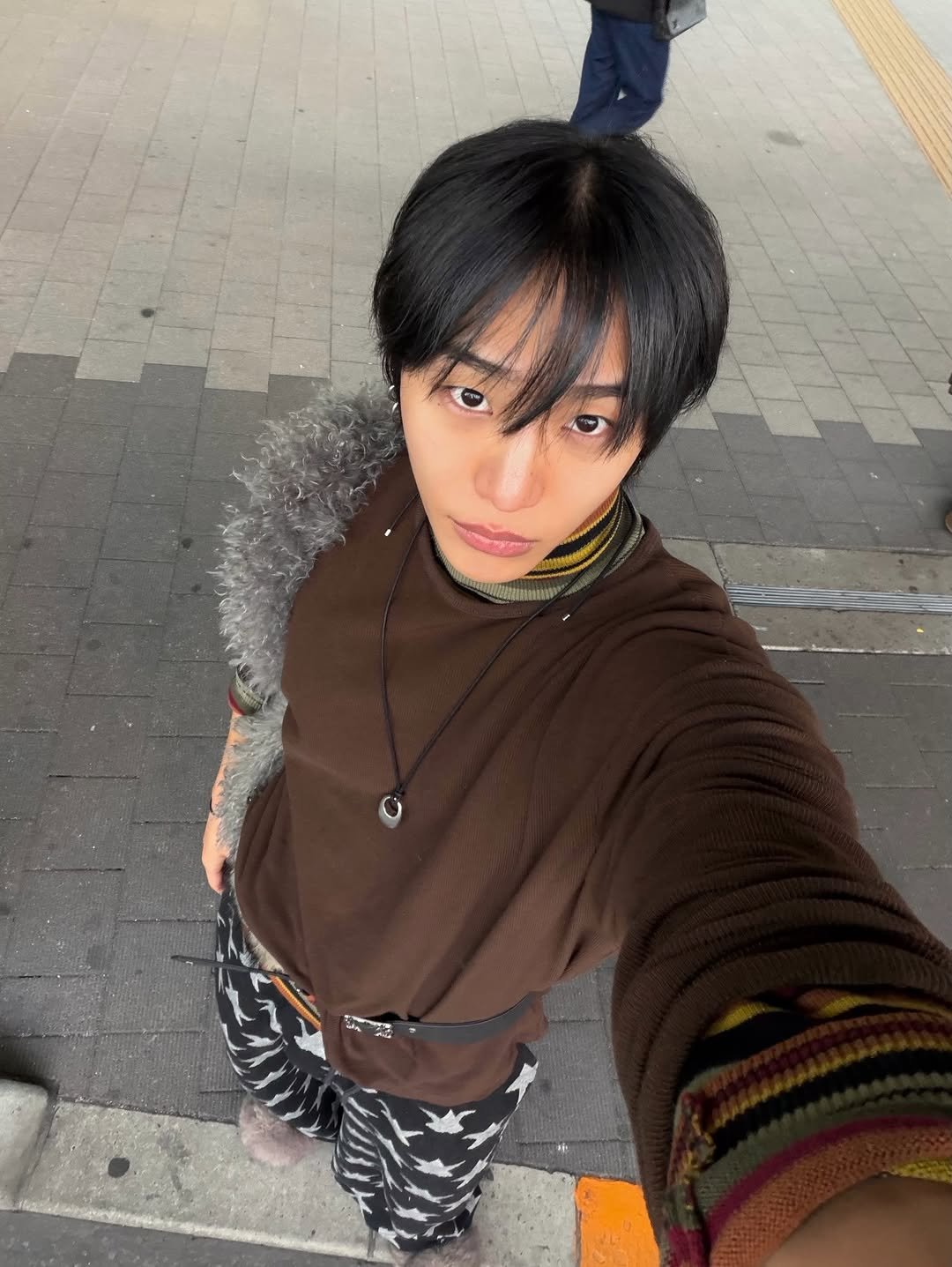 Photo by 조우진 on February 01, 2026. May be a selfie of one or more people, bangs, duffle coat, turtleneck, bolo tie, top and text.