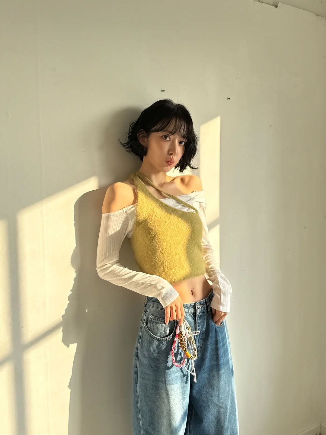 Photo by Sakura Miyawaki on January 26, 2026. May be an image of crochet, top and text.