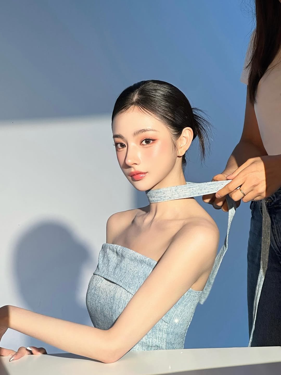 Photo shared by 권은지 on September 05, 2025 tagging @_twinkle_makeup_. May be an image of 2 people, makeup, hair, dress, gown and text.
