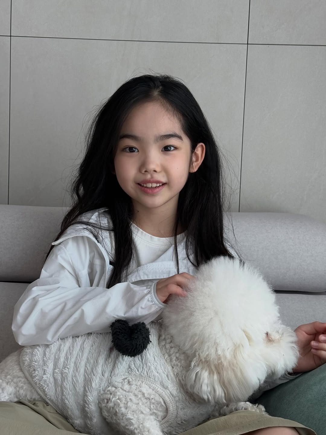 Photo by Hwang sumi_오은서 on March 26, 2026. May be an image of child, Bedlington terrier, fur and text.