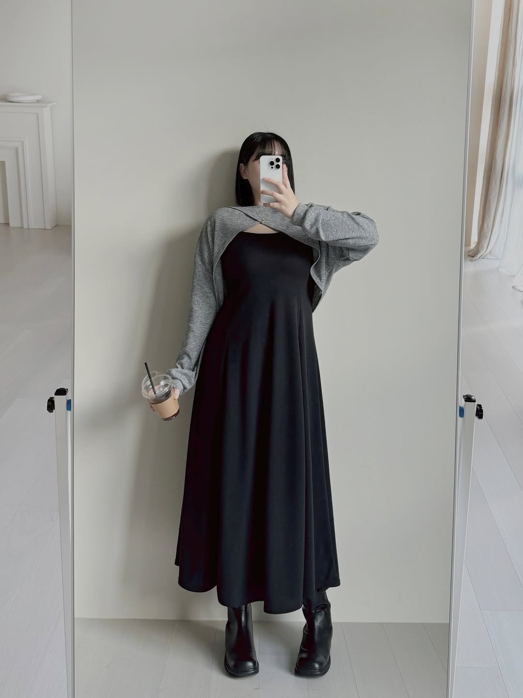 Photo by 식스앤드 | 66•77사이즈 쇼핑몰 on November 23, 2025. May be an image of cloak, turtleneck, dress and text.