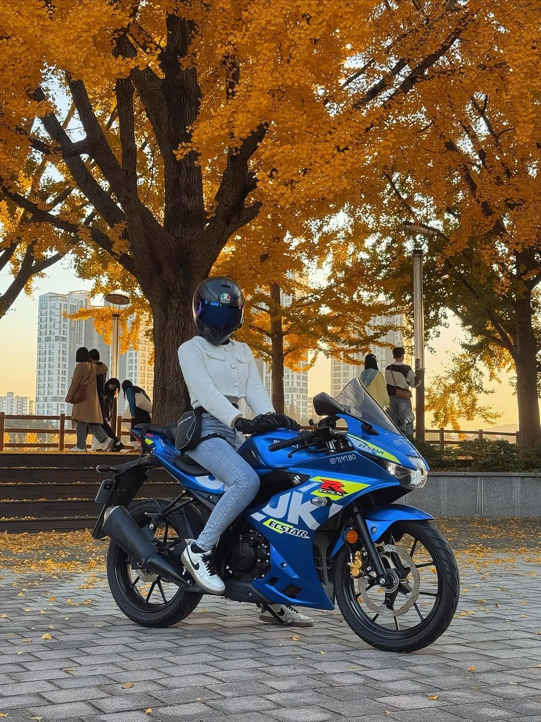 Photo by 말차라떼 on November 13, 2025. May be an image of racing vehicles, motorcycle, scooter, helmet, road and text.