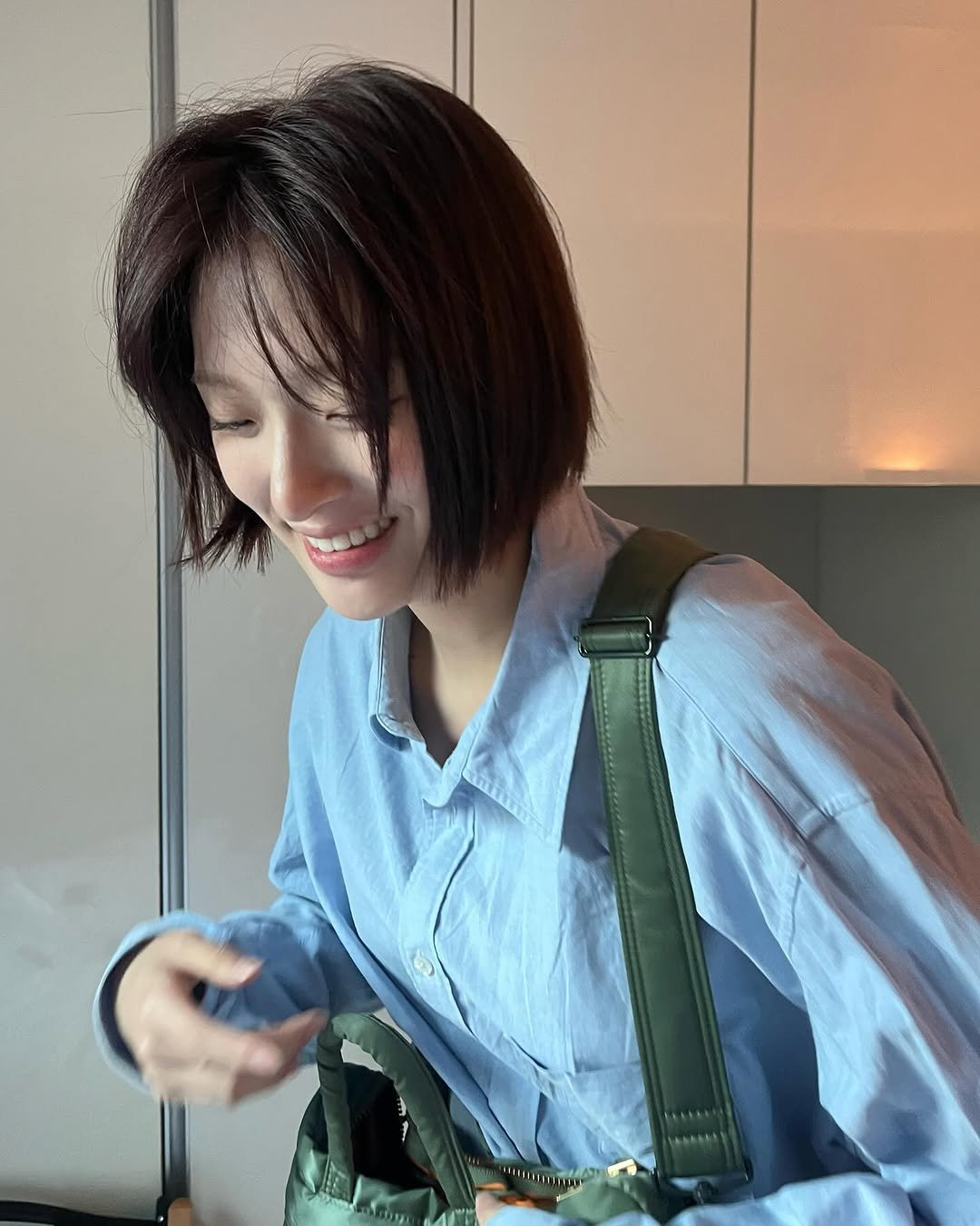 Photo by min on June 24, 2025. May be an image of 1 person, hair, sling, cornflower and text.