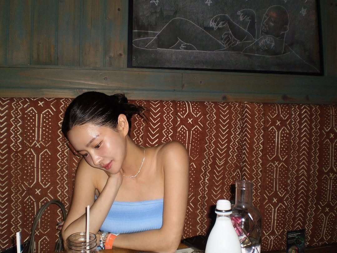 Photo by 이유빈 on July 14, 2025. May be an image of 1 person, hair, cigarette and text.