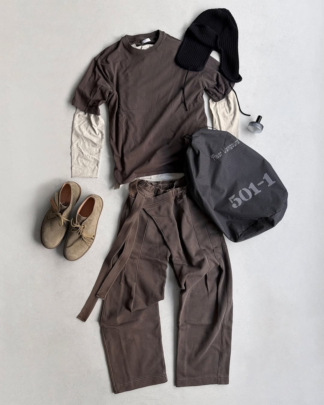 Photo shared by 8DIVISION on December 17, 2025 tagging @huntism_tokyo, @astorflex_official, @seasalt.contact, @somewhereoutside.world, @receptor.official, and @symmetricalsociety. May be an image of tool bag, pants, drawstring, sweatpants and text.