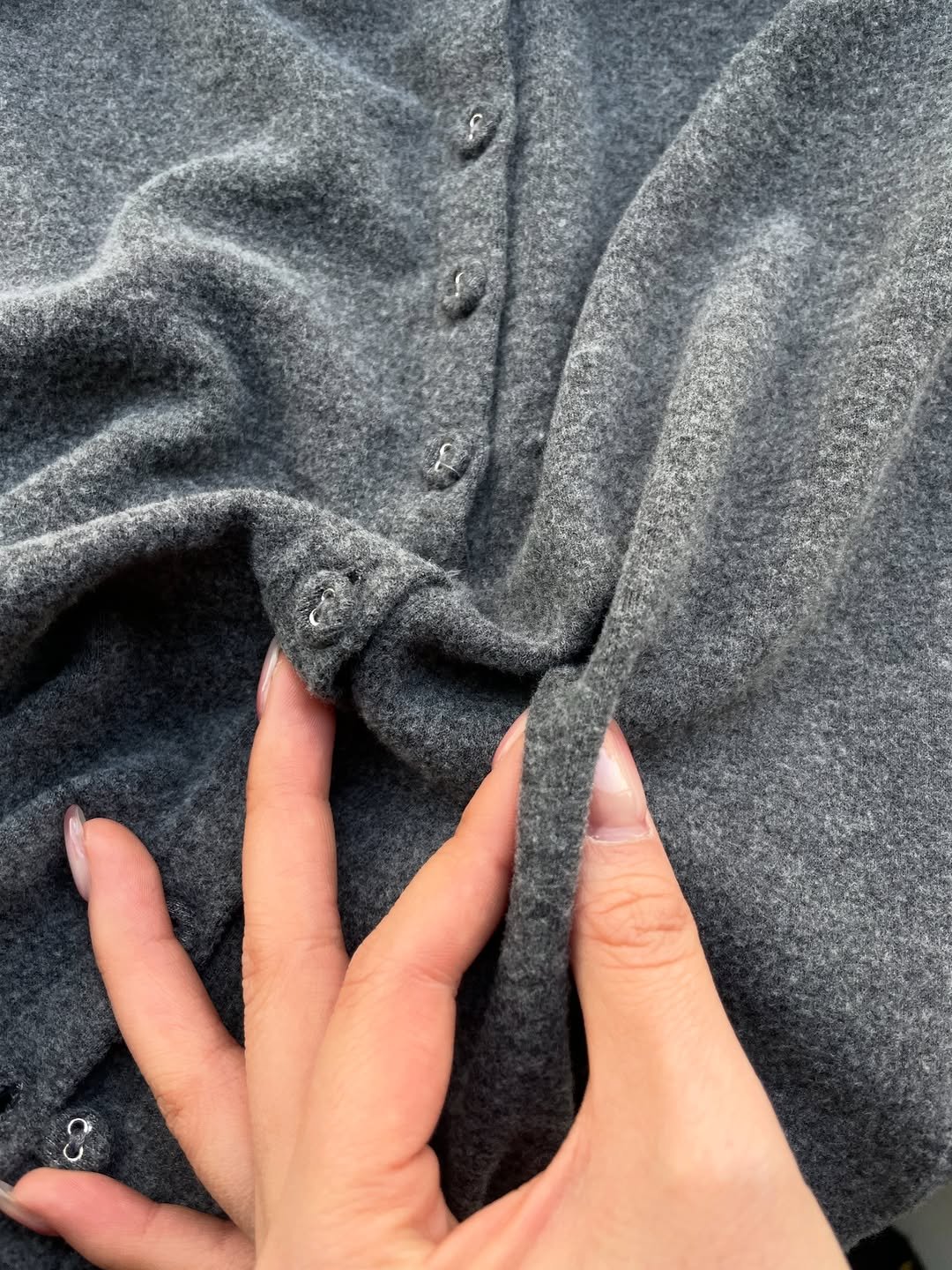 Photo shared by INNIR on December 15, 2025 tagging @8division. May be an image of wool, cardigan, fleece and text.