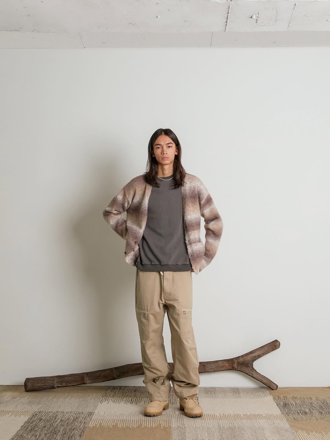 Photo shared by 8DIVISION on September 12, 2025 tagging @8division_rtw. May be an image of 1 person, goosedown coat, fur coat, cardigan, fleece, wool, parka and text.