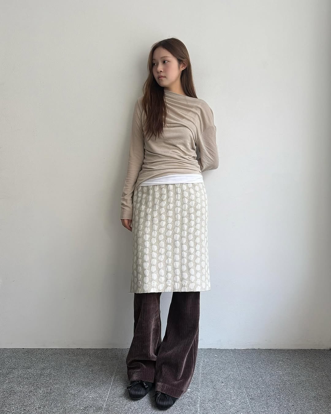 Photo shared by 8DIVISION on October 29, 2025 tagging @_nothingeverything, and @reposseoul. May be an image of knit, turtleneck and text.