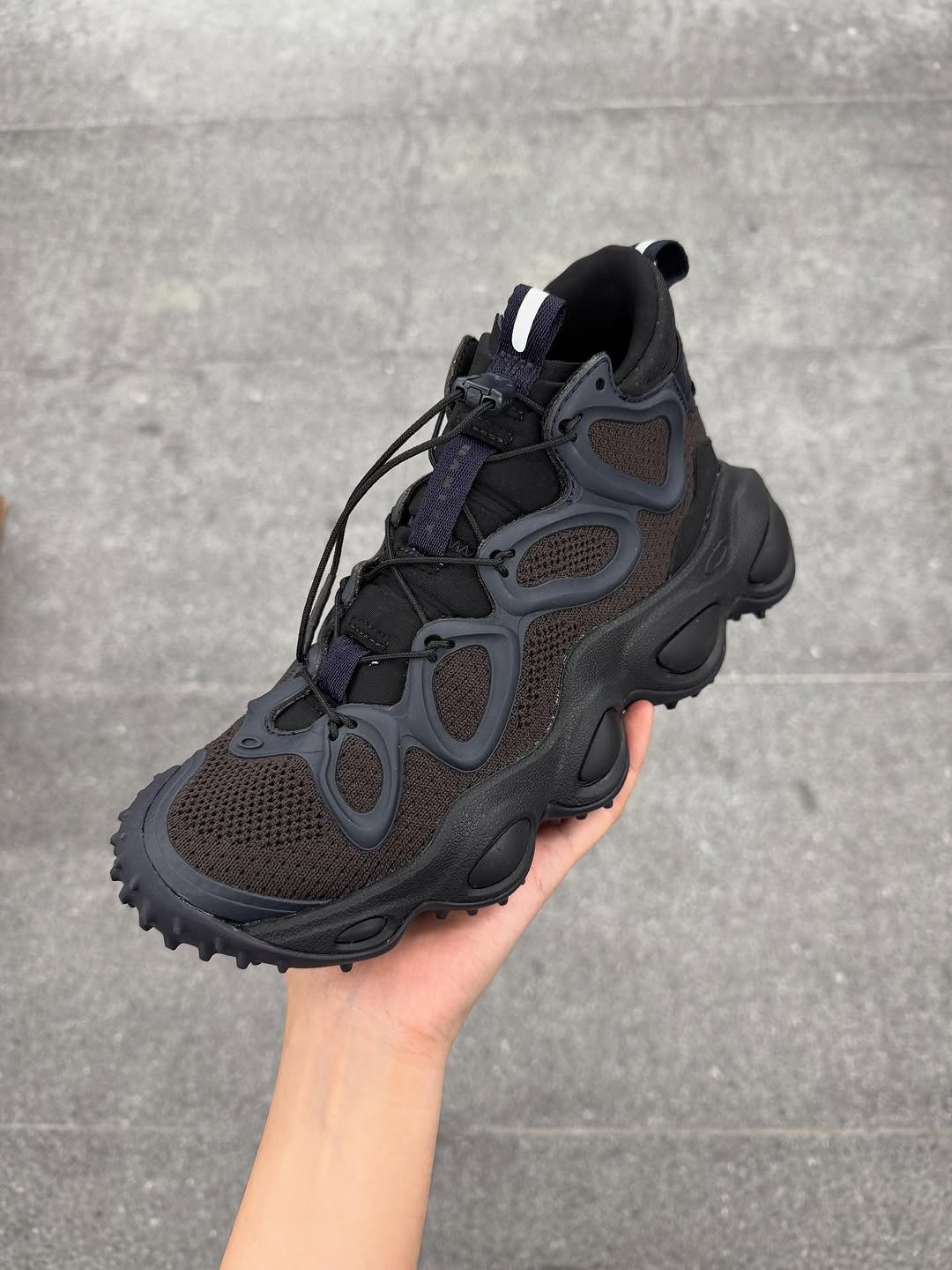 Photo shared by 8DIVISION on November 05, 2025 tagging @oakley. May be an image of boots, sneakers and text.