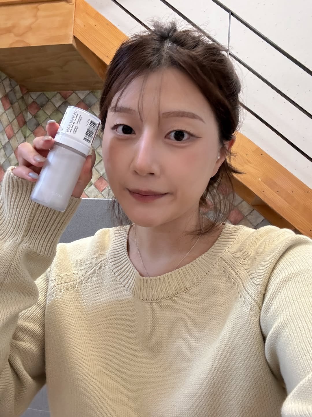 Photo shared by 키키야𖤐 on December 03, 2025 tagging @millimilli.official. May be an image of one or more people, hair, lotion, bottle and text.