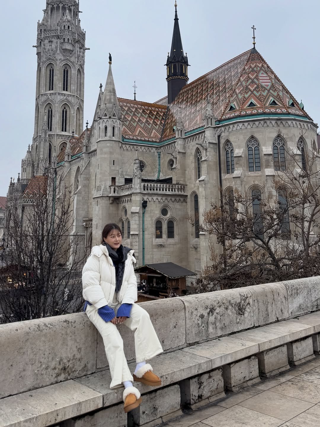 Photo shared by 키키야𖤐 on December 23, 2025 tagging @comme_zi_rack. May be an image of Sacré-Cœur, castle and text.