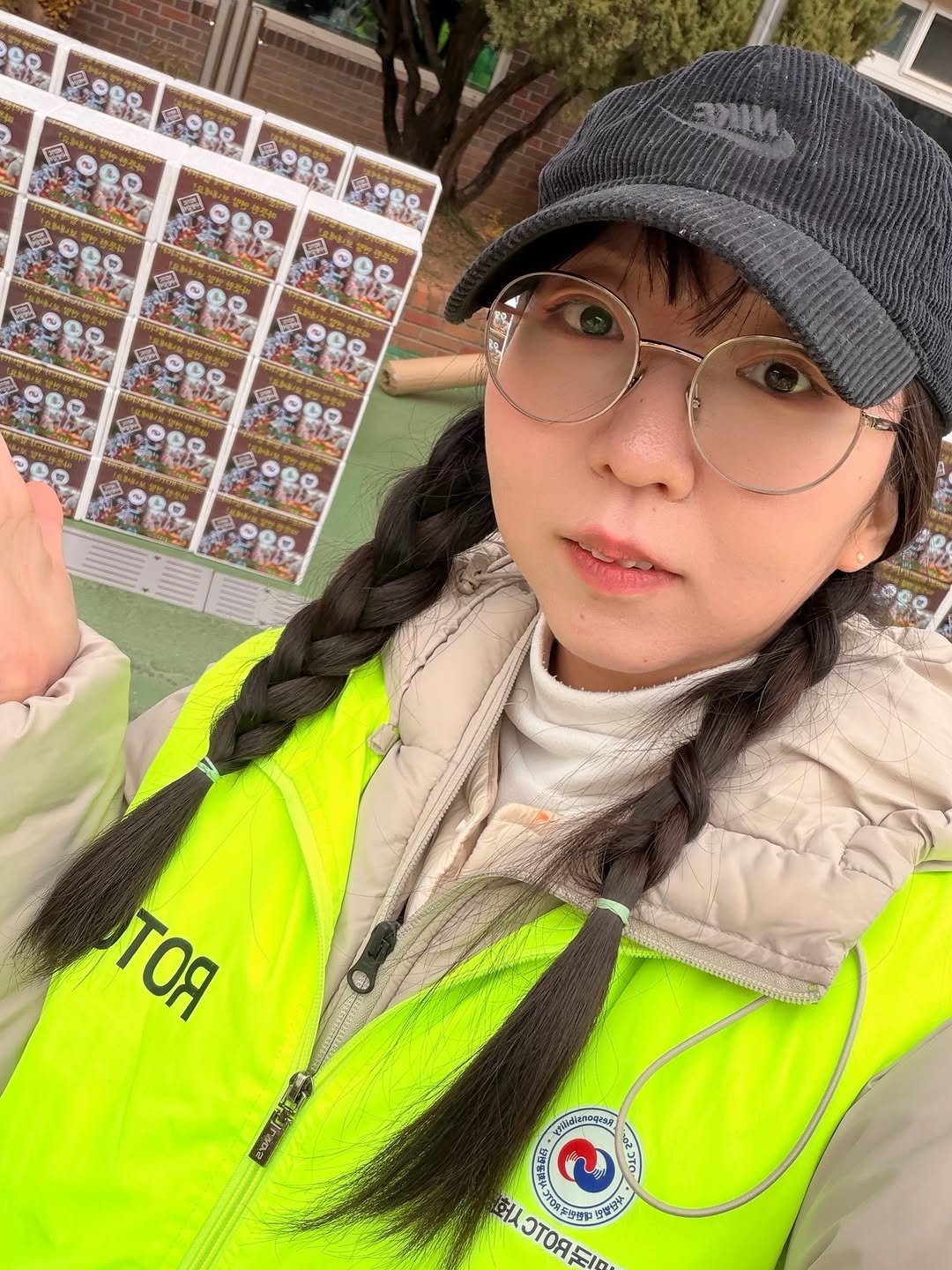 Photo shared by @9seul_5 on November 29, 2025 tagging @9seul_s. May be an image of eyeglasses, duffle coat and text.