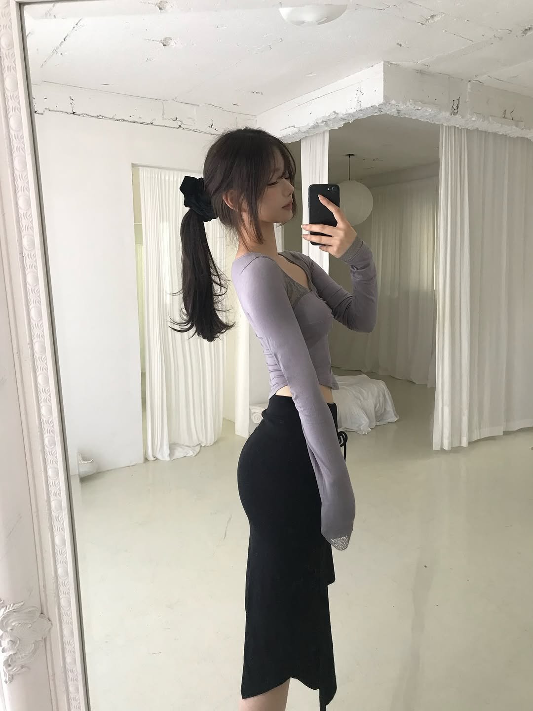 Photo shared by 백여경 on November 11, 2025 tagging @baeklit.kr. May be an image of turtleneck, top, dress, skirt, miniskirt and text.