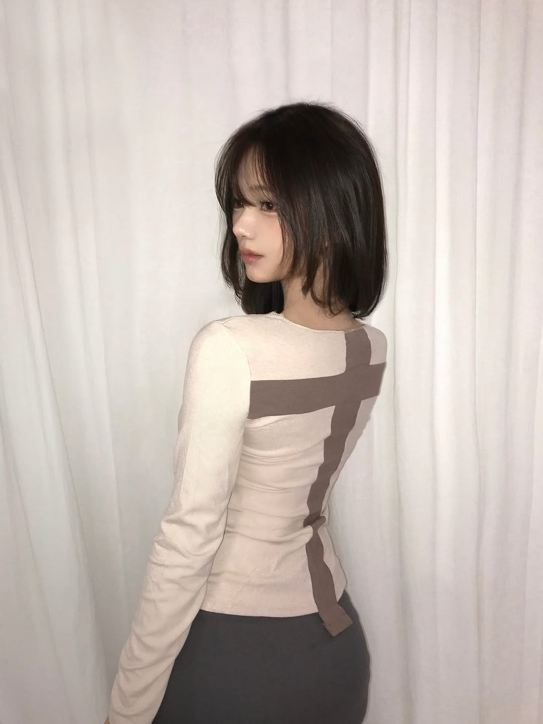 Photo shared by 백릿 on November 11, 2025 tagging @bykeoe, and @baeklit.kr. May be an image of one or more people, hair, top, turtleneck and text.